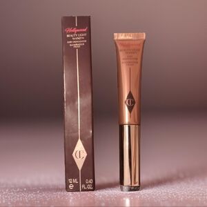 NEW Charlotte Tilbury Beauty Highlighter Wand - Spotlight (swatched)